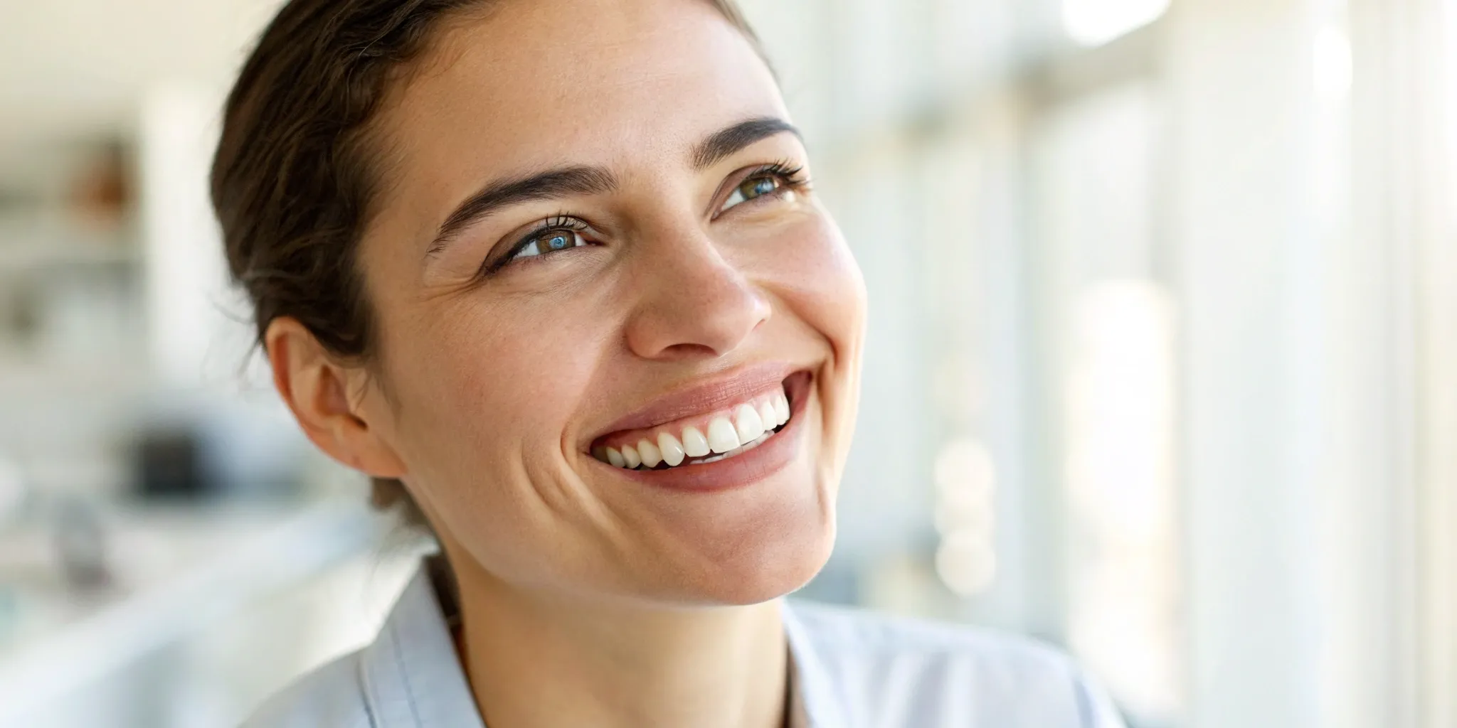 Confident smile after Teeth in a Day procedure.