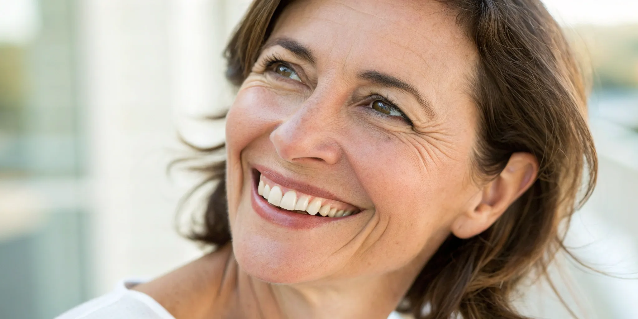Permanent false teeth provide a natural-looking smile.